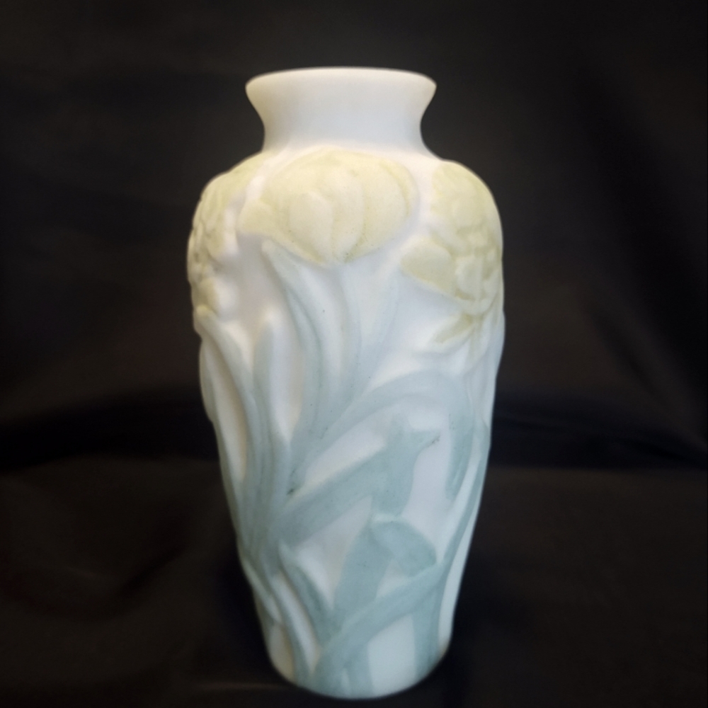 Porcelain vase with embossed flowers